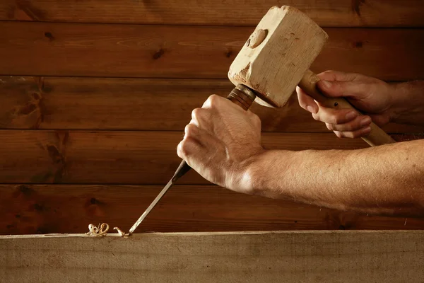 Gouge wood chisel carpenter tool hammer hand — Stok fotoğraf