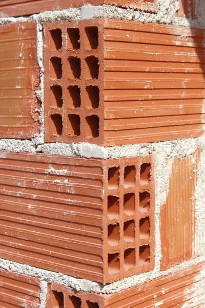 Brick corner edge red construction clay bricks — Stock Photo, Image