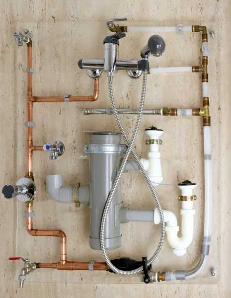Copper plumbing installation and polyethylene pvc — Stock Photo, Image