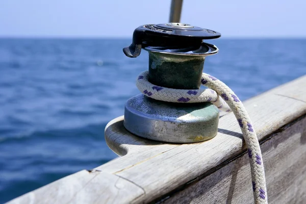 Sail boat winch with marine rope arround — Stock Photo, Image