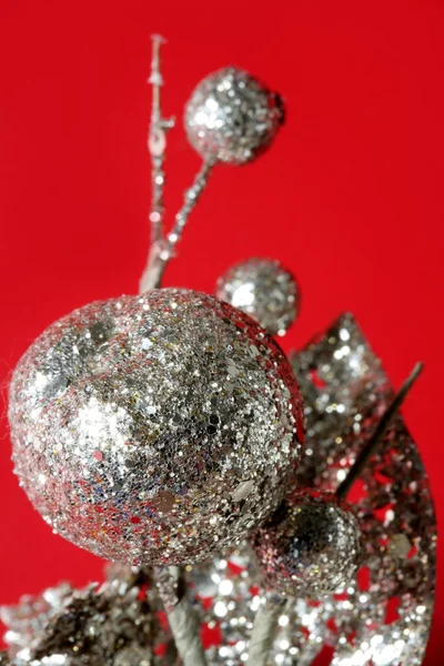 Christmas decoration detail over red — Stock Photo, Image
