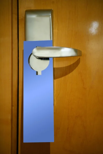 Hotel door handle with a copy space note — Stock Photo, Image