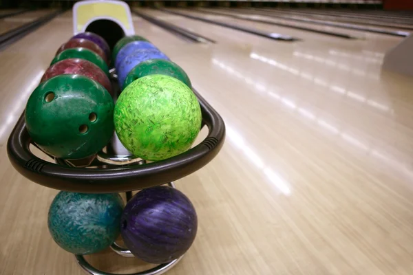 Bowling balls perspective in game center — Stock Photo, Image