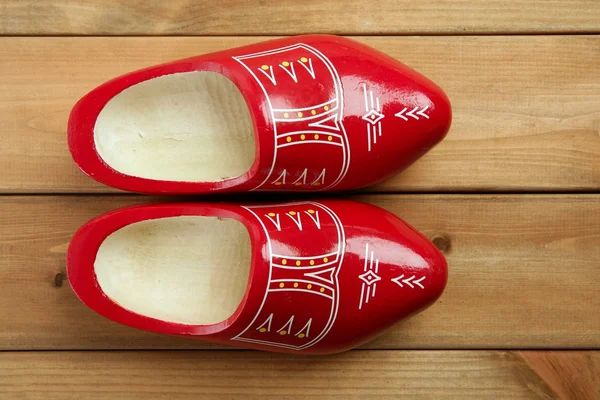 Dutch Holland red wooden shoes on wood — Stock Photo, Image