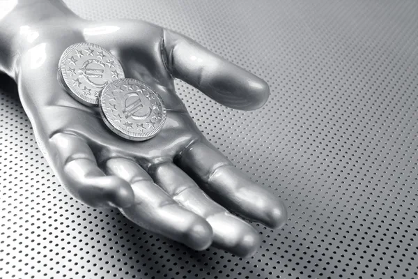 Futuristische Euro-Business-Münze silberne Hand — Stockfoto