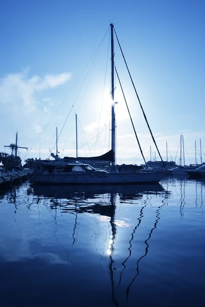 Blue marina sunset boats with water reflection — Stock Photo, Image
