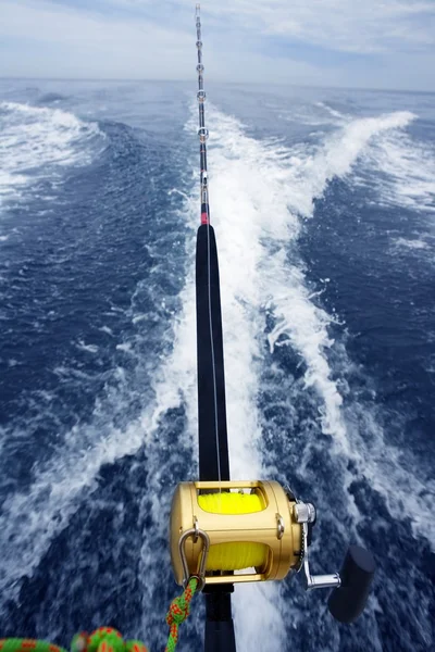 Fishing big game rod and reel on boat wake — Stock Photo, Image