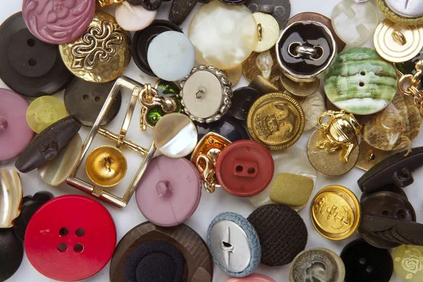 Ropa botones colección desorden patrón —  Fotos de Stock