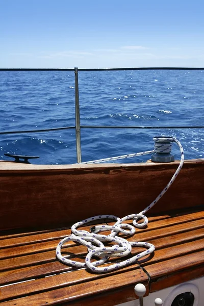 Wooden sailboat boat deck blue sky ocean sea — Stock Photo, Image