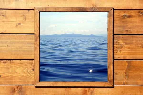 stock image Window seascape view from wooden room