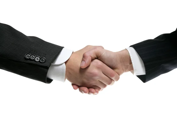 Партнеры по бизнесу пожимают друг другу руки с иском — стоковое фото