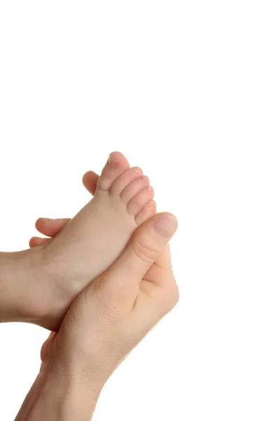 Mother and son, daughter holding feet — Stock Photo, Image