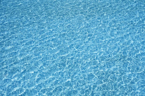 Piscina azul água textura transparente reflexão — Fotografia de Stock