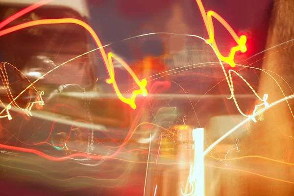 Homályos city lights motion blur színes háttérrel — Stock Fotó