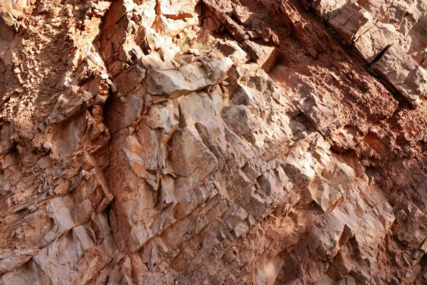 Background red rodeno limestone rock texture — Stock Photo, Image