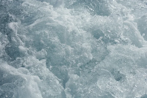 Blå vatten texturer, vågor skum, åtgärder, havet — Stockfoto