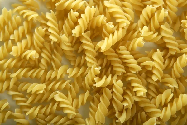 Italian spiral pasta texture — Stock Photo, Image