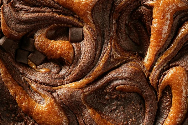 Csokoládé torta termés makró textúra, arany fény — Stock Fotó