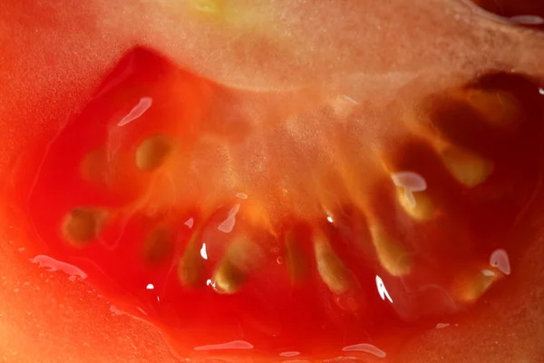 Макротекстура красного помидора — стоковое фото