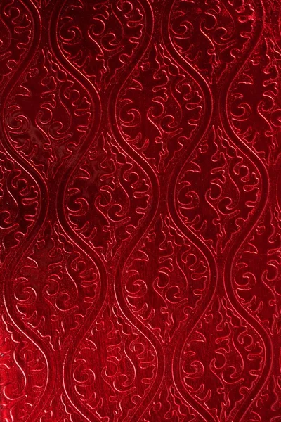 Papel de parede vermelho, brilhante e decorado — Fotografia de Stock