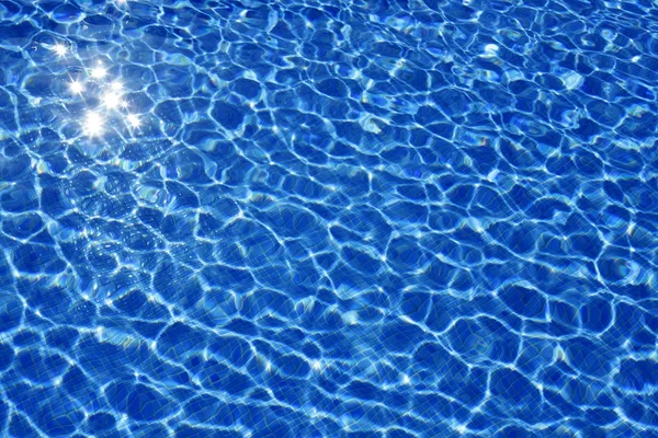 Blue water texture, tiles pool in sunny day — Stock Photo, Image