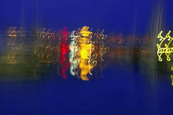 Abstract night blurry colorful lighs over blue — Stock Photo, Image
