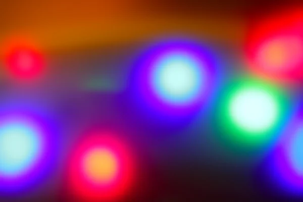 Disco colorido borrado dançando luzes vivas da noite — Fotografia de Stock