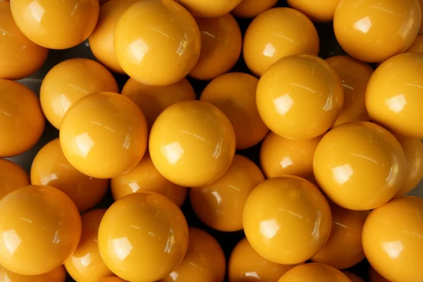 Biljard många gula bollar rader bakgrund konsistens — Stockfoto