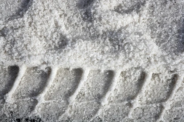 Salt texture with truck footprint for road ice — Stock Photo, Image