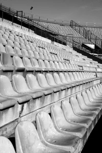 Aged seats in football stadium perspective — Stock Photo, Image