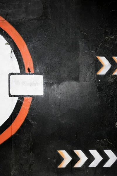 Black and orange graffiti detail with copy space — Stock Photo, Image