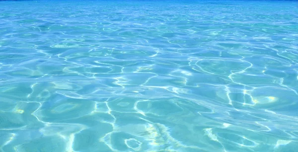 Tropiska perfekta turkos beach blå vatten — Stockfoto