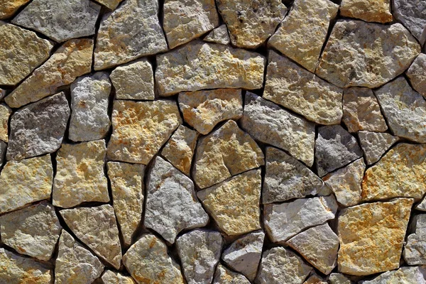 Metselwerk stenen muur rots bouwpatroon — Stockfoto