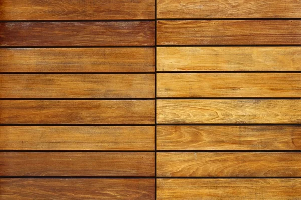 Listras de madeira dourada padrão de porta fundo — Fotografia de Stock