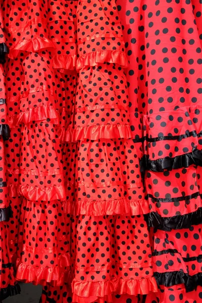 Taches rouges gitanes robe texture fond — Photo
