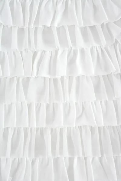 Jupe plissée tissu mode en gros plan blanc — Photo