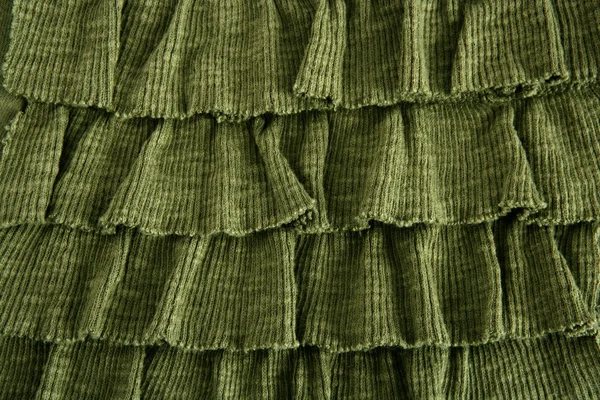 Pleated skirt fabric fashion in green closeup — Stock Photo, Image