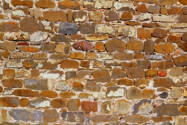 Construção de pedra de parede de alvenaria colorida — Fotografia de Stock