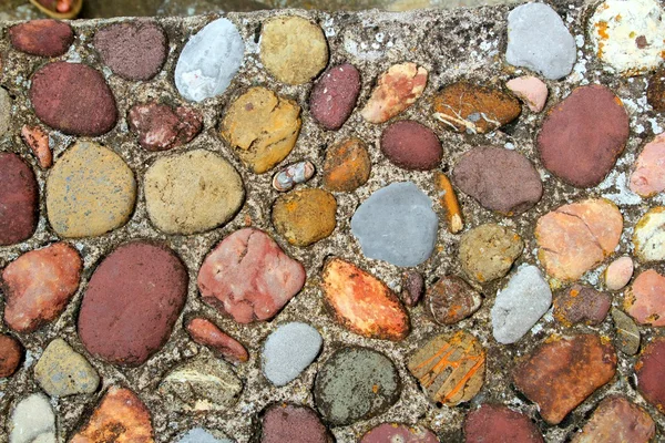 Rolling pavimento di pietre modello colorato in Pirenei — Foto Stock