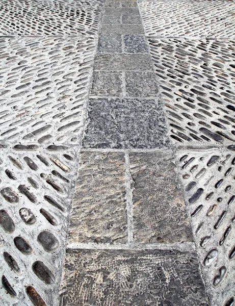 Rolling stones mosaic medieval soil floor Spain — Stock Photo, Image