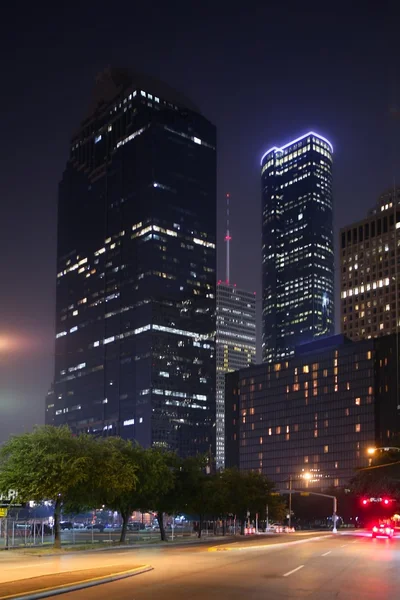 Kék éjszakai város fényeit és épületek a houston — Stock Fotó
