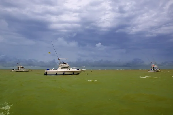 stock image Africa Saly Senegal green ocean boat