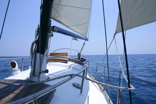 Sailing with an old sailboat over mediterranean sea Stock Photo