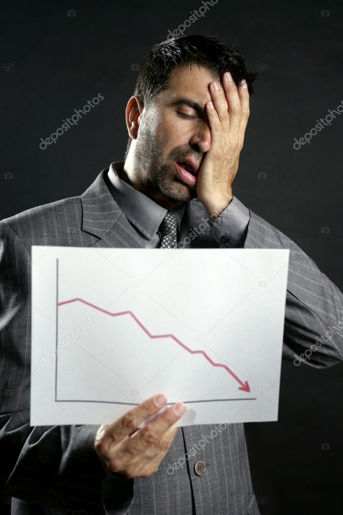 Businessman with bad sales reports chart