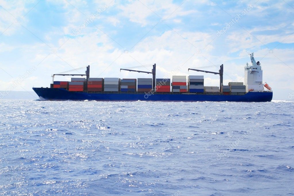 Sea cargo merchant ship sailing blue ocean