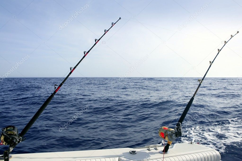Blue Mediterranean fishing boat rod and reels