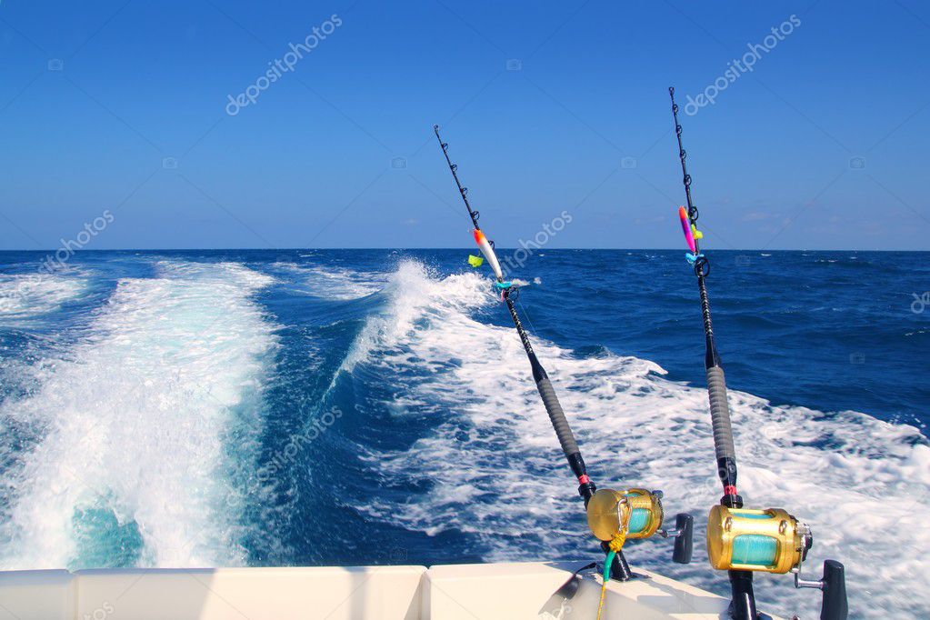 Boat Trolling Fishing Gear Downrigger and Two Rods Stock Photo