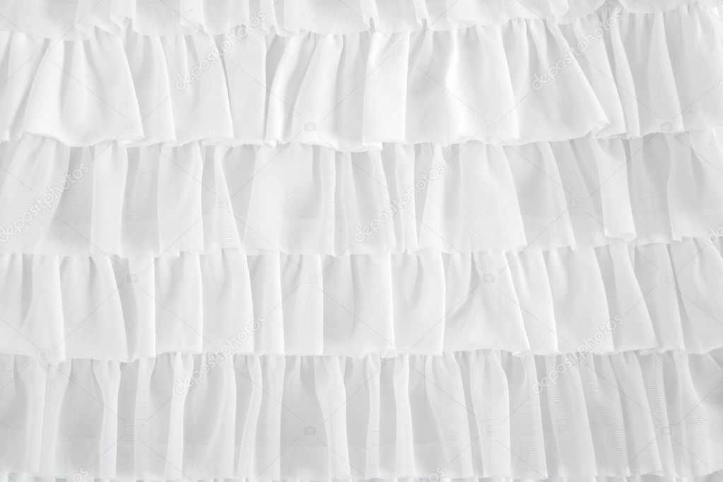 Pleated skirt fabric fashion in white closeup