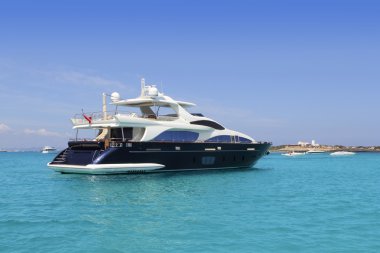 Luxury yacht in turquoise Illetes Formentera