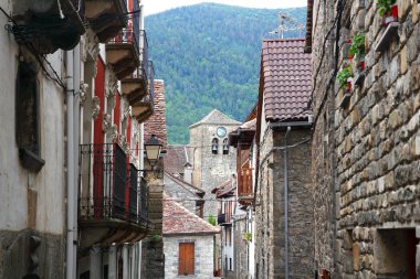 Anso Village street stone houses in Pyrenees clipart